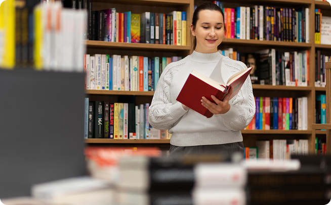Student reading in library